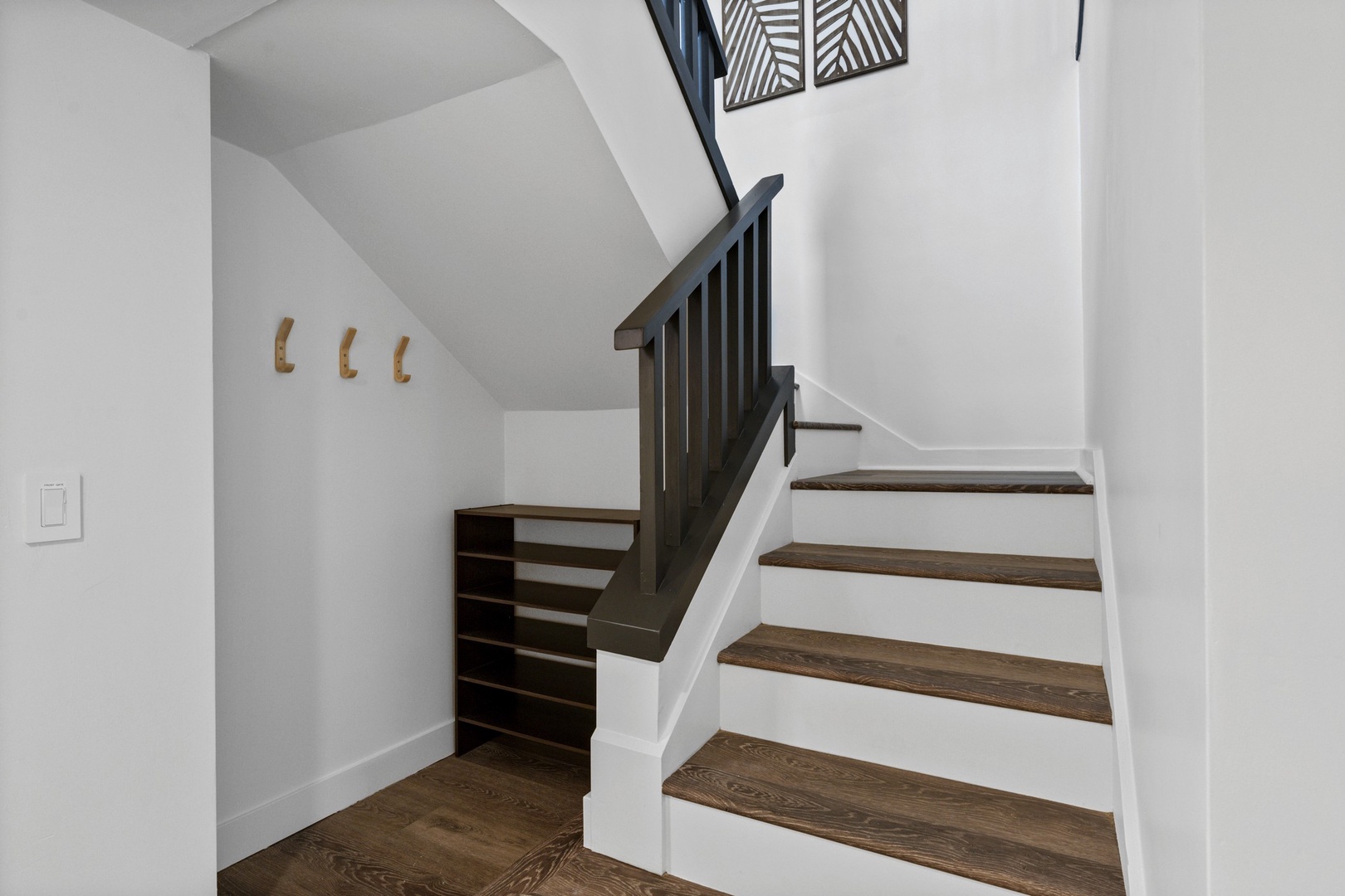 Stairs to upper level with railings