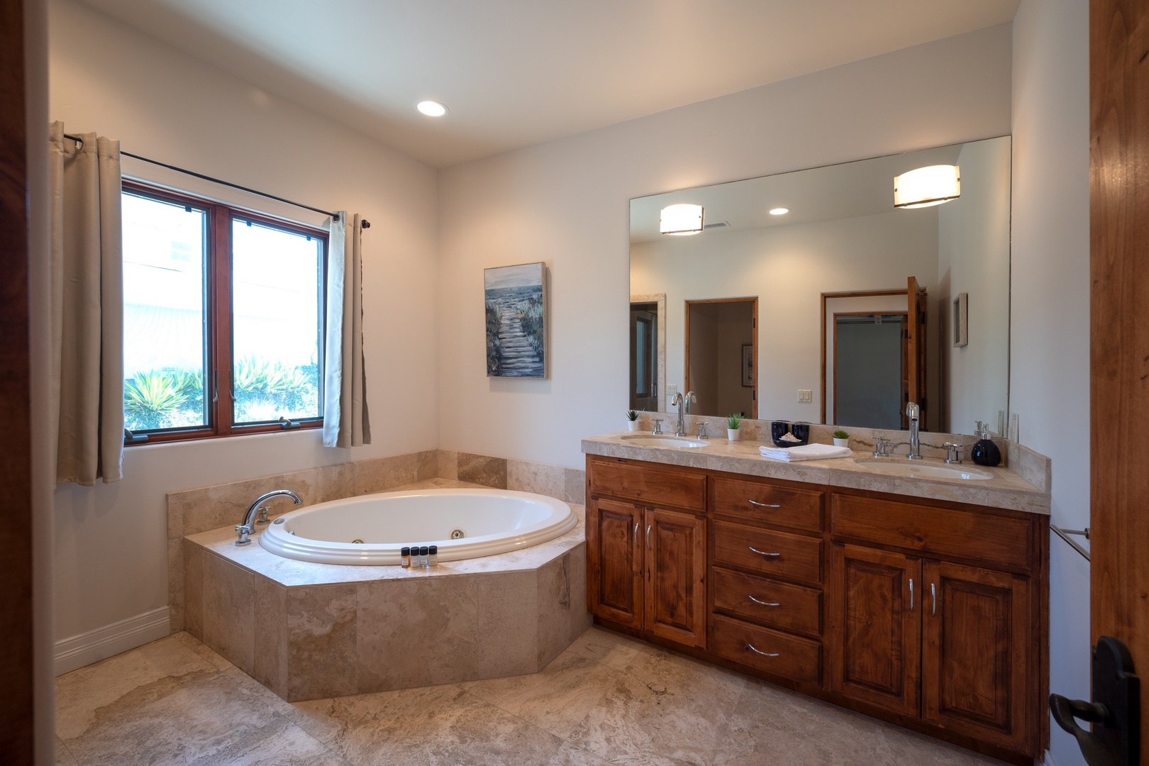 En suite bathroom with jetted tub and shower