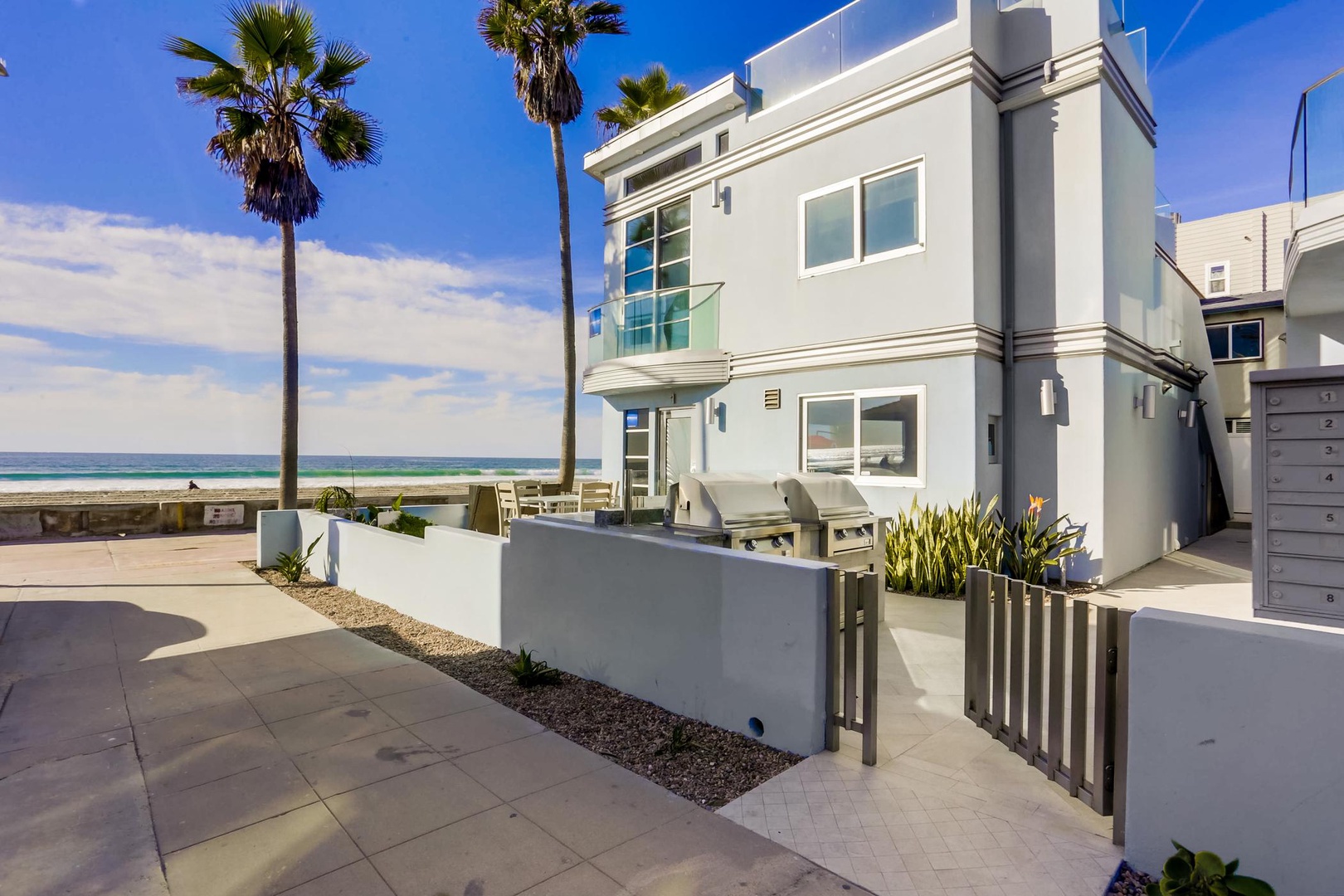 Patio with BBQ and ocean views