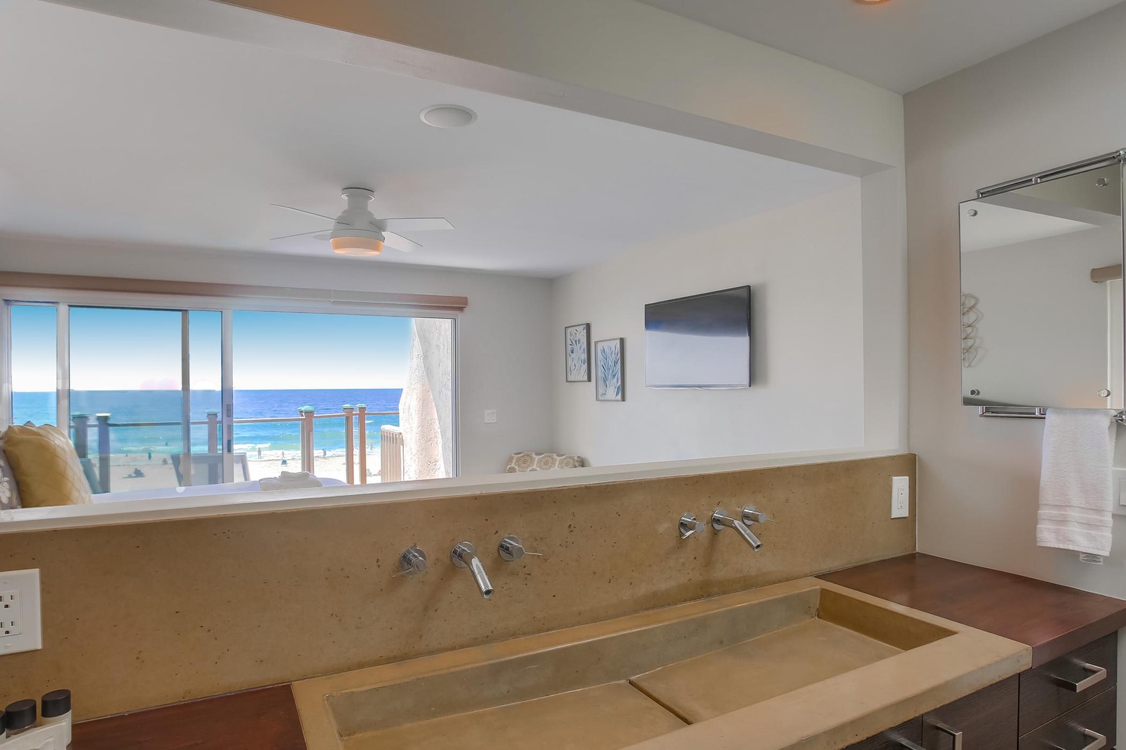 En suite bathroom with ocean views