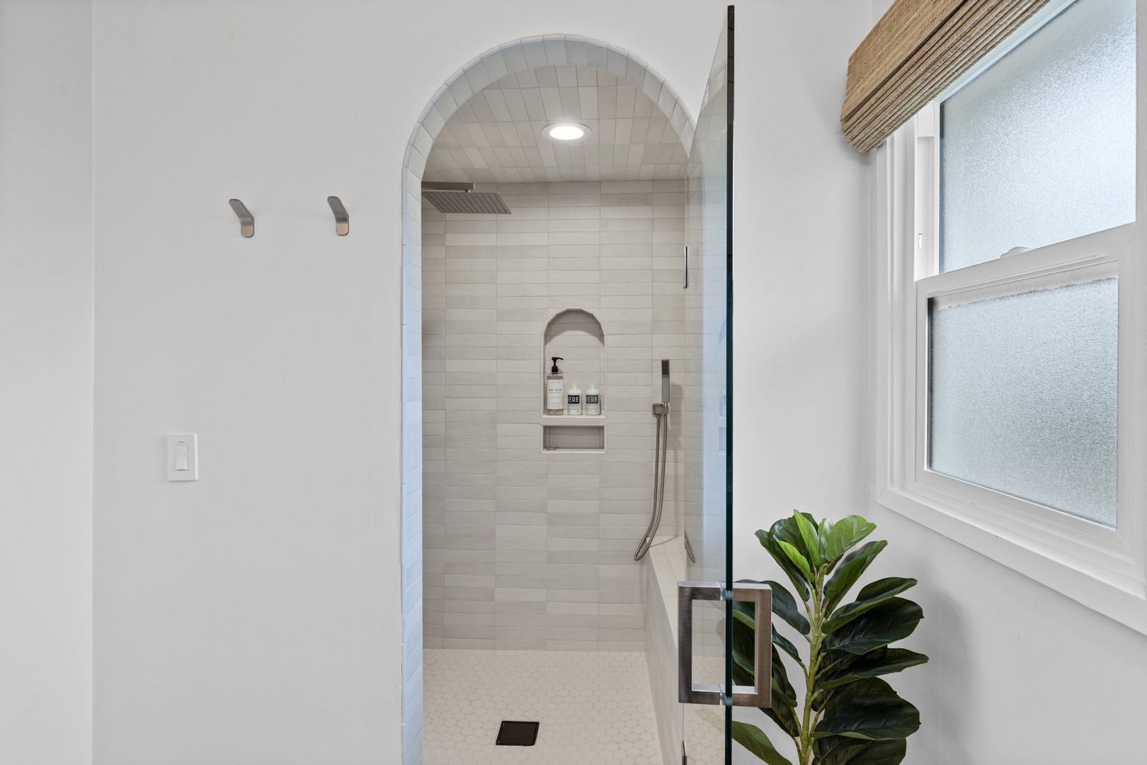 Arched shower in the Primary bathroom