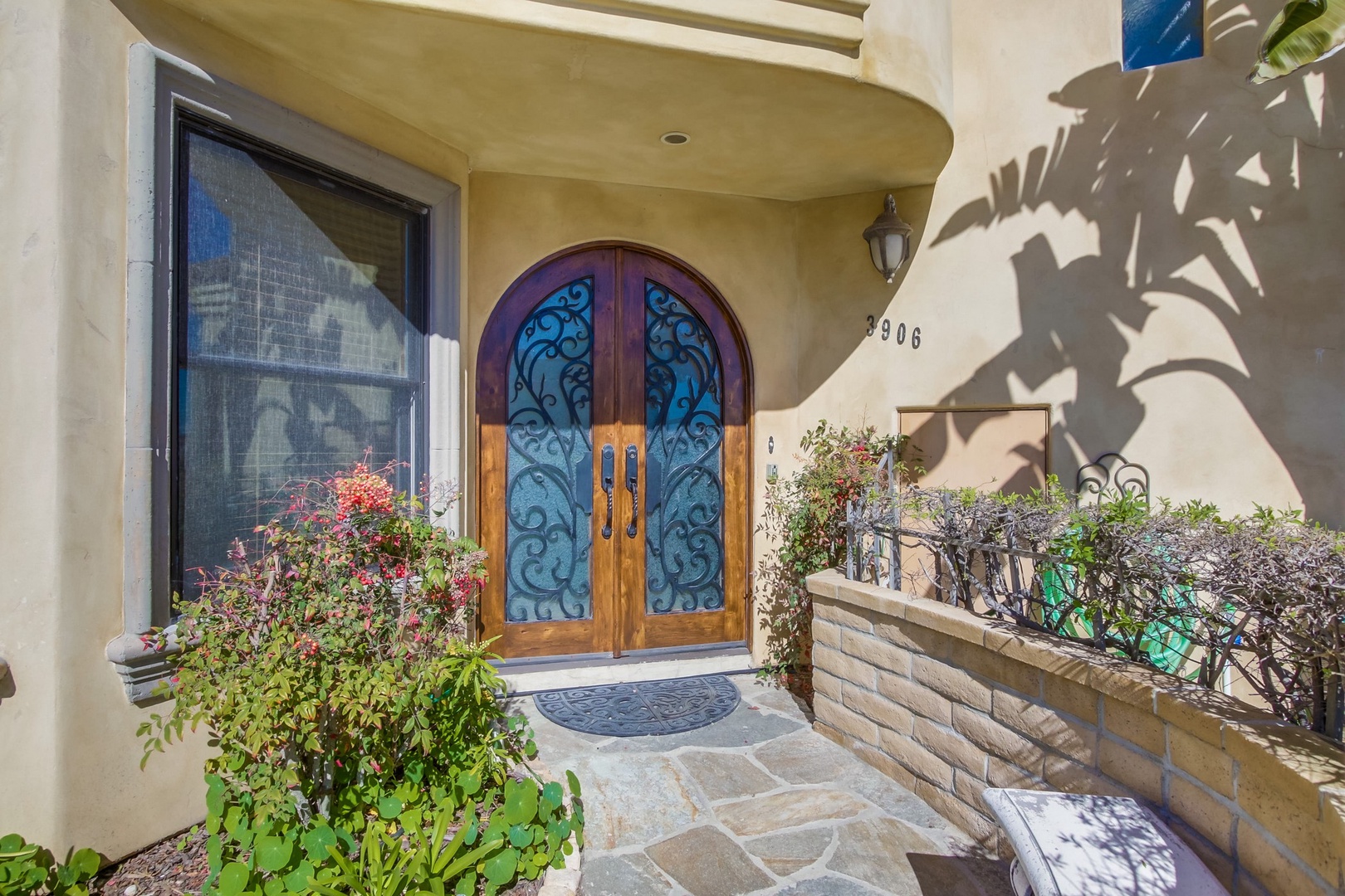 Grand iron and wood door entry