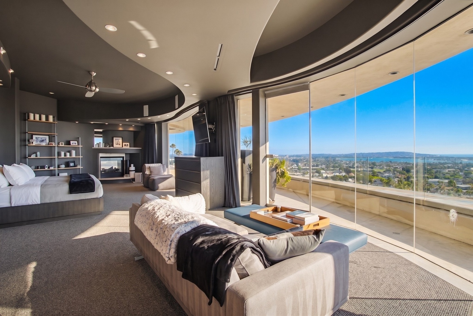 Sleek Primary suite with sweeping views