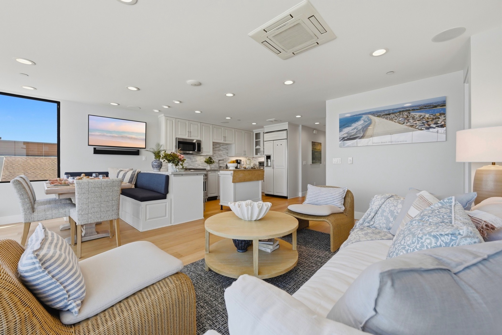 Sink into plush seating with coastal tones