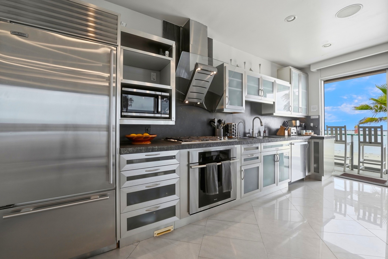Sleek, modern kitchen features stainless steel appliances