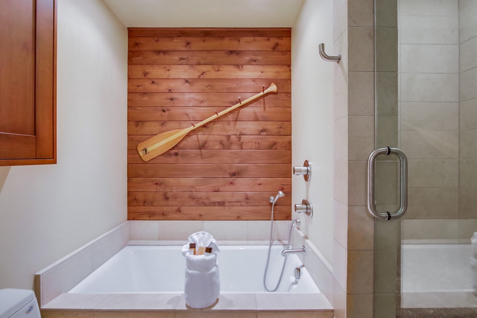 Features a tub and shower