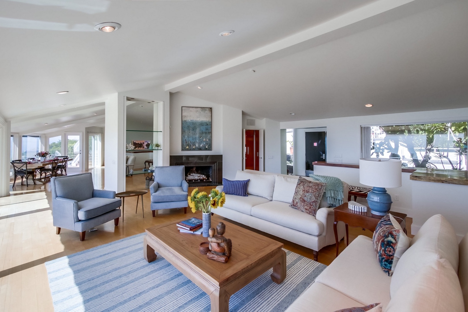 Living room towards dining and kitchen