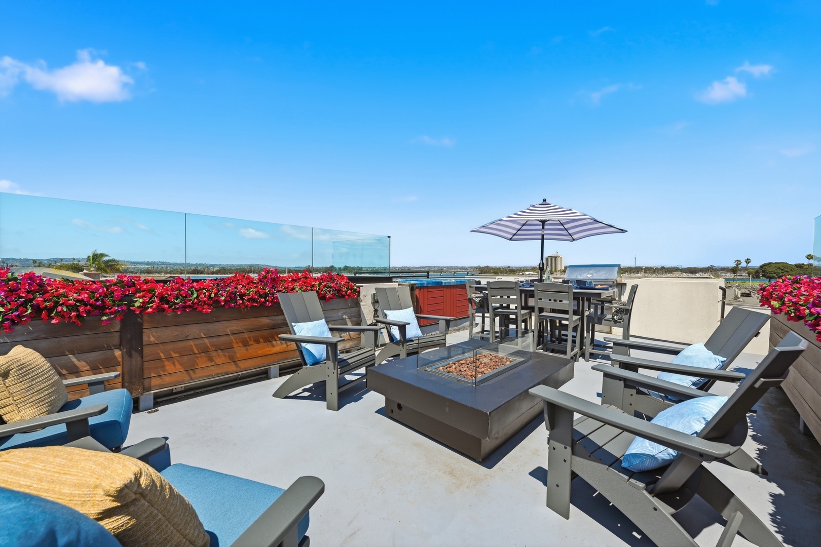 Adirondack chairs for the fire pit on the rooftop deck
