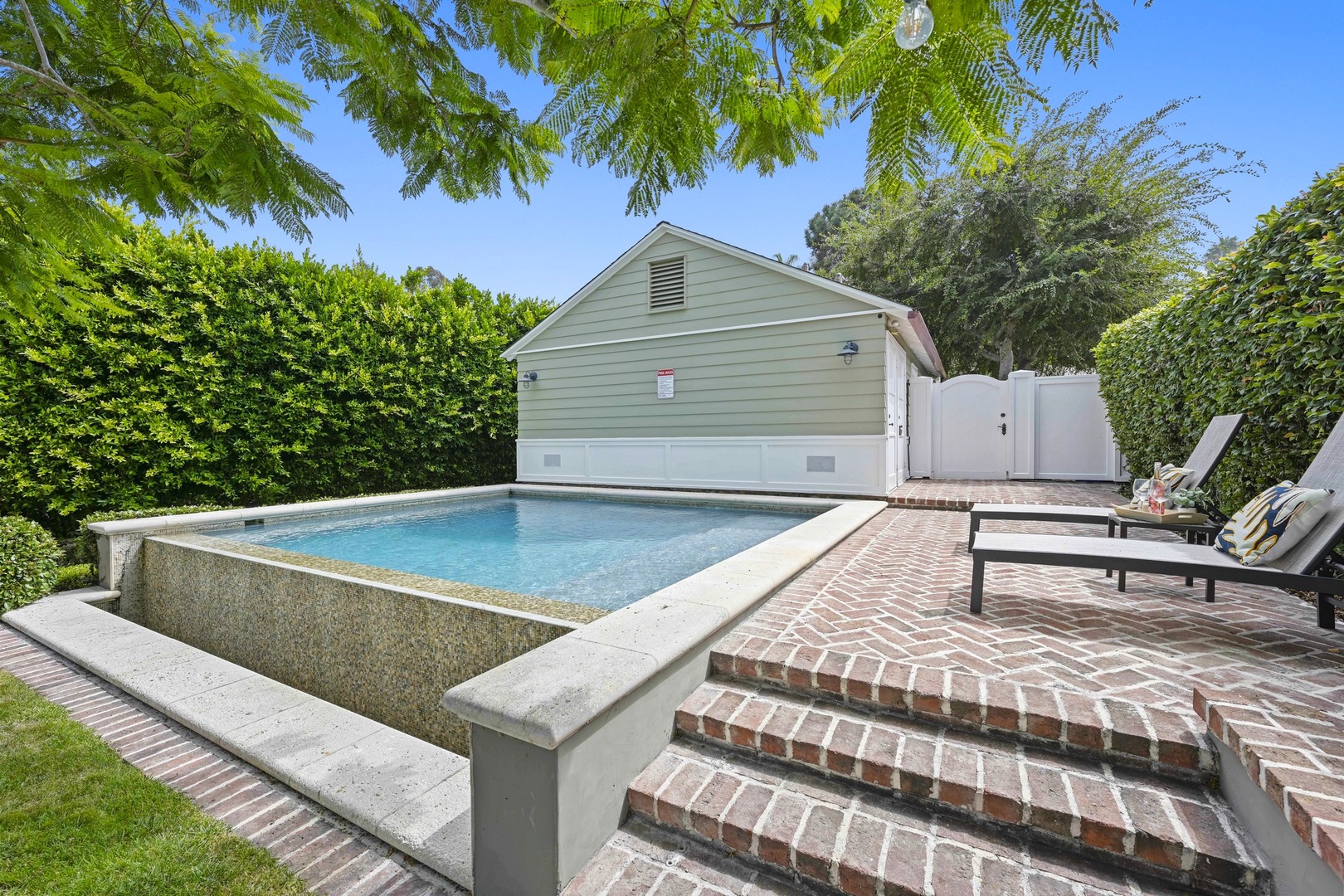 Plunge pool with waterfall edge