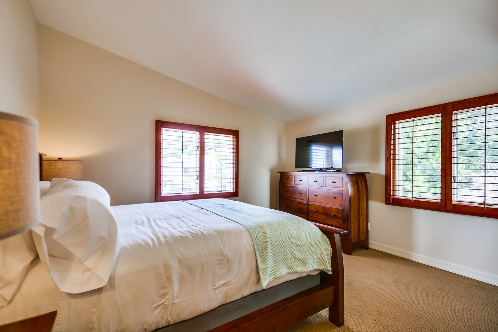 Bedroom 3 features a TV