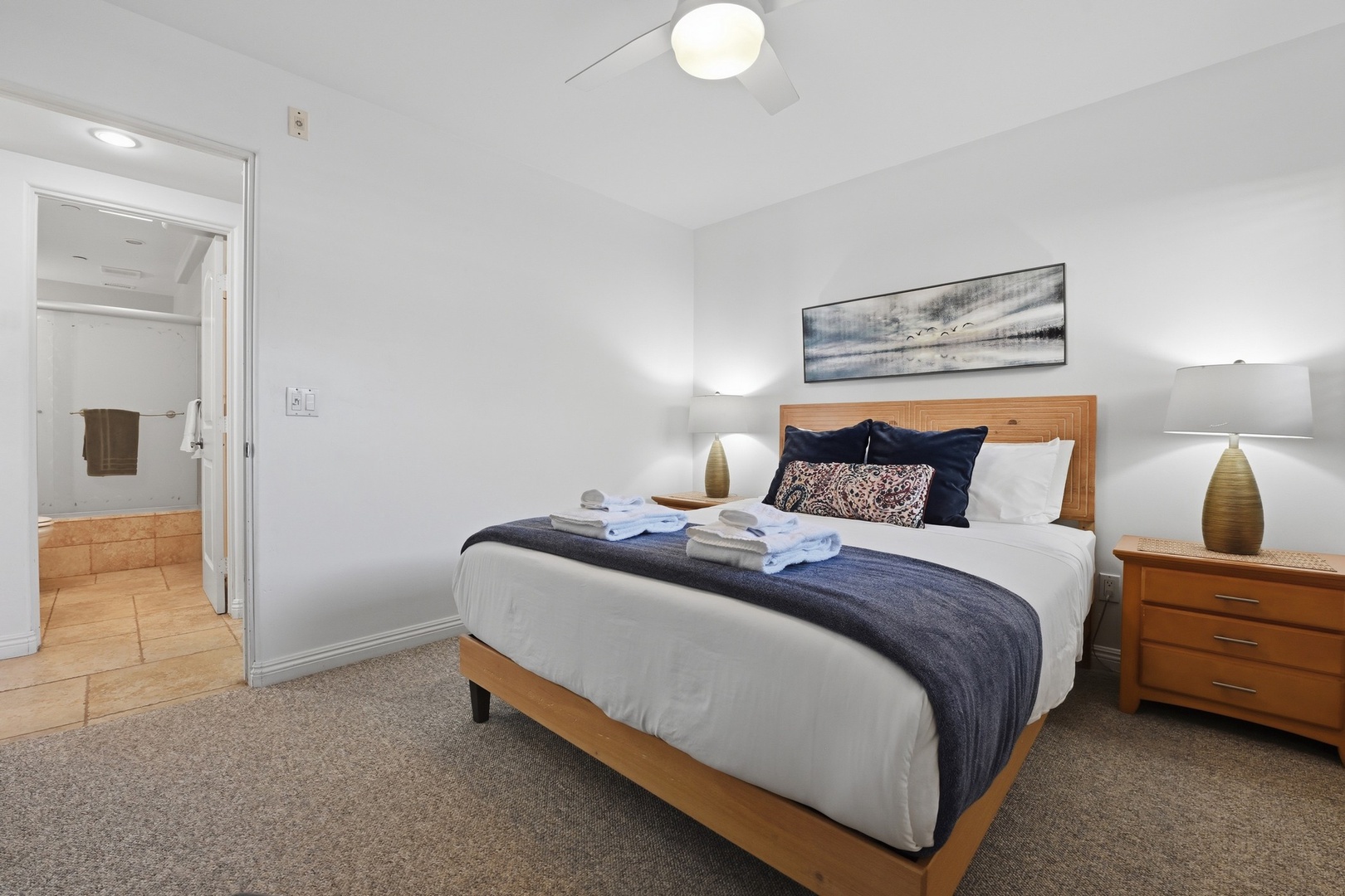 Sink into your comfortable bed with crisp linens and fluffy towels, while soft lighting creates the perfect ambiance for relaxation.