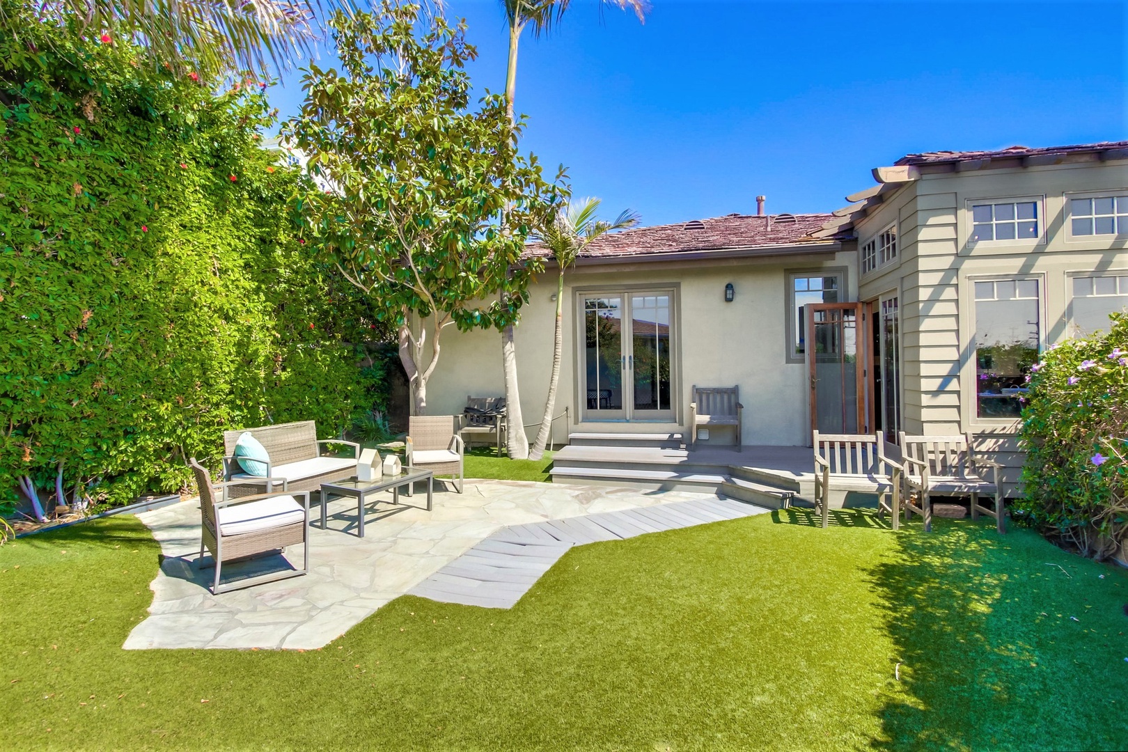 Side yard with lounge seating