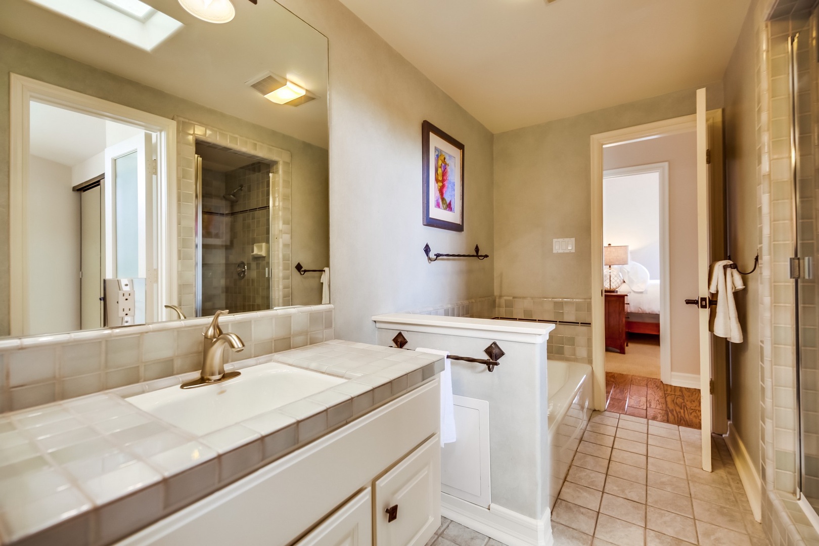 Bathroom with walk-in shower and tub