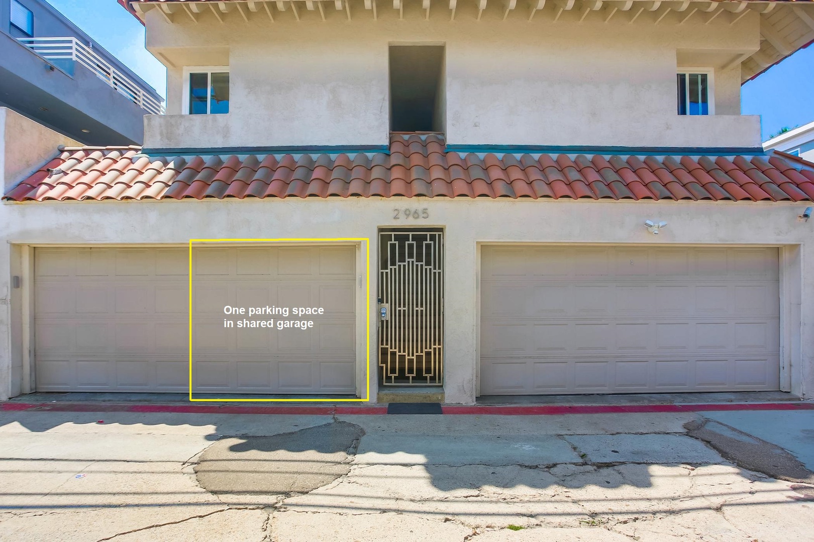 One smaller car space in garage