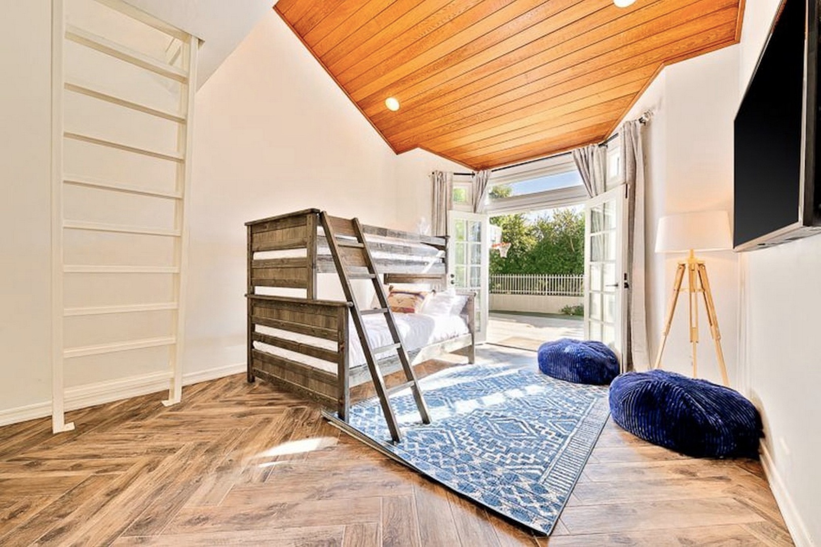 Bunk room opens to the sport court