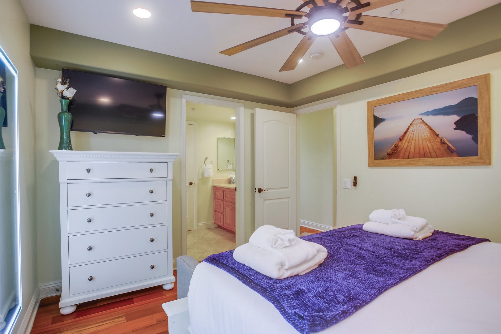Bedroom 2 with queen bed and TV
