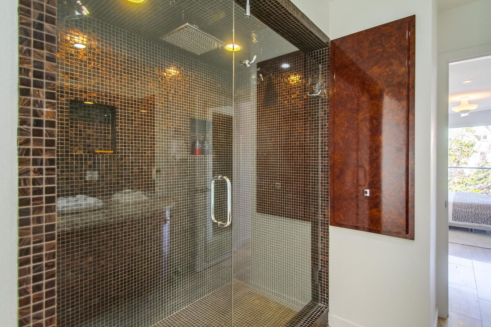 Oversize glass-tiled, walk-in shower