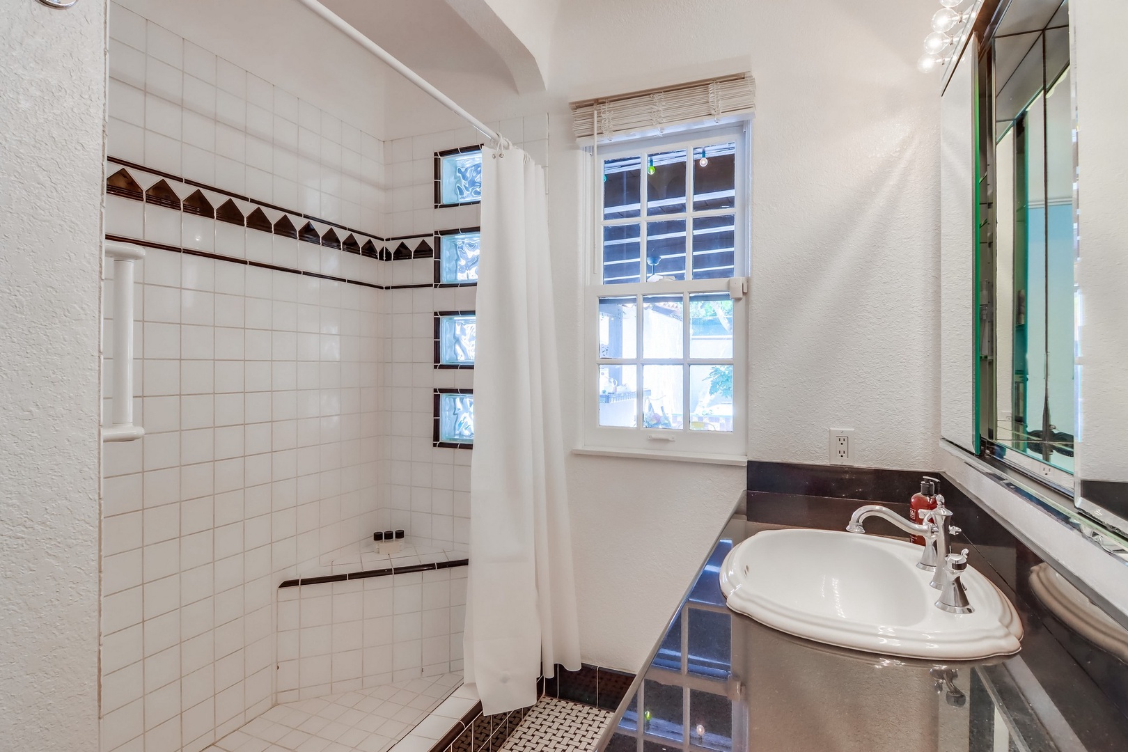 Hallway bathroom with shower