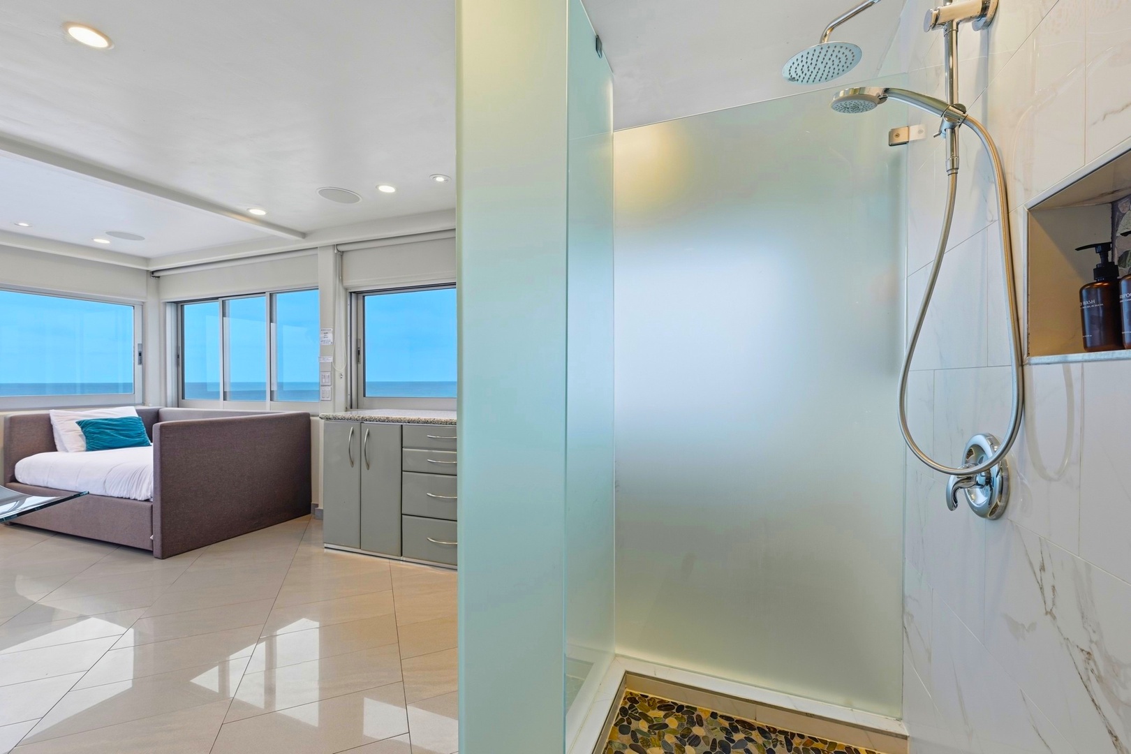 Ensuite features a sleek walk-in shower with a rainfall head