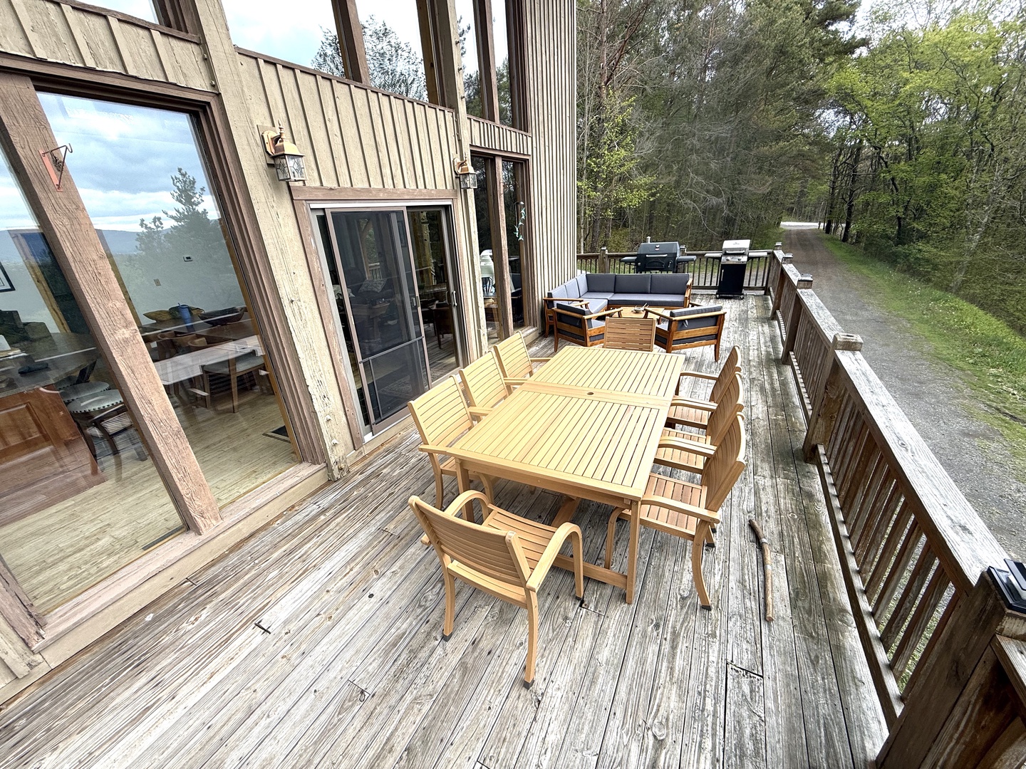 Step onto your spacious private deck and breathe in the fresh air. Gather around the outdoor dining table for meals with a view, or unwind on the comfortable lounge seating surrounded by nature.