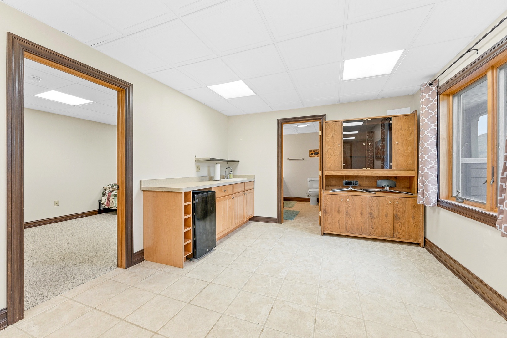 This kitchenette offers everything you need to prepare light meals and snacks during your stay, with a mini-fridge and ample counter space.