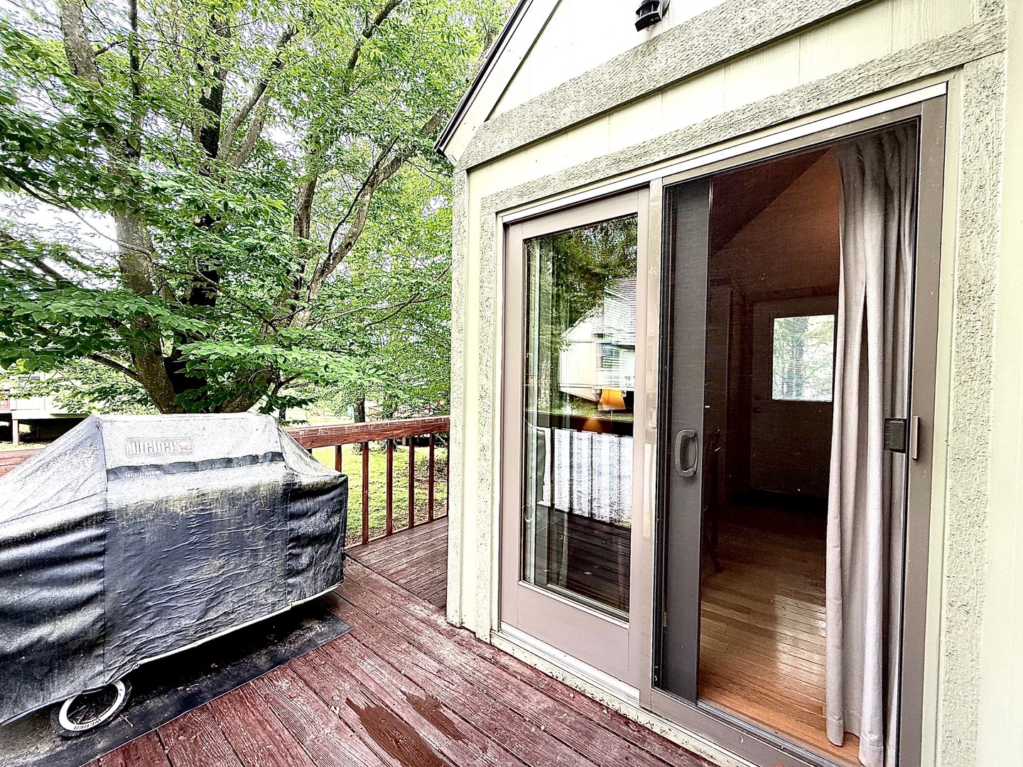 Step onto your private deck where morning coffee tastes better surrounded by leafy trees and fresh air.
