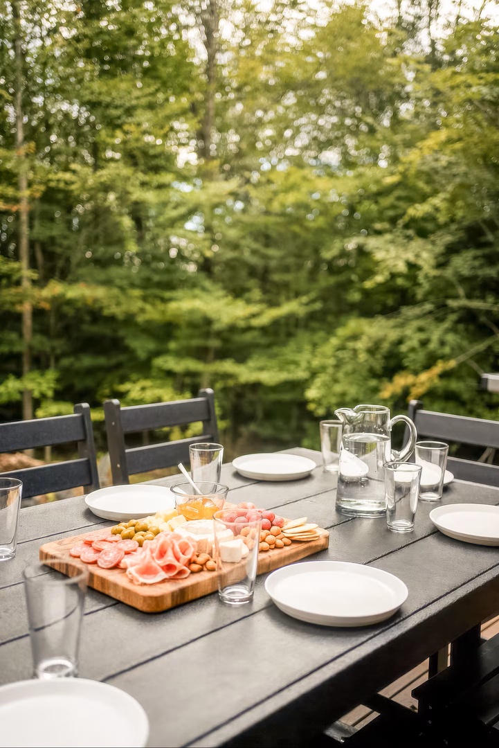 Savor your morning spread on this peaceful garden terrace surrounded by lush greenery. Your private outdoor dining space invites leisurely meals in the fresh air.