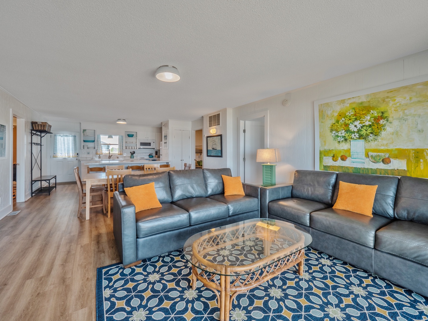 First Level - The open living area with an oceanfront balcony and Smart TV