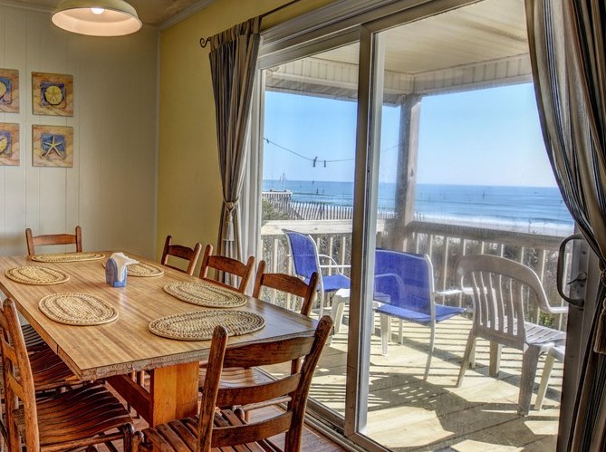 9 215 Kirks Memas Beach dining and kitchen by UM 471678 cropped out old floor