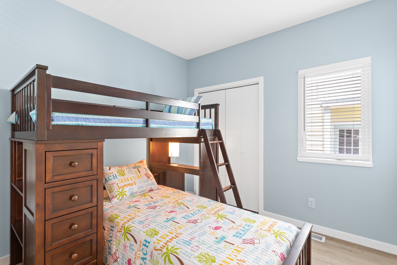 The guest bedroom with a twin bunk and Smart TV