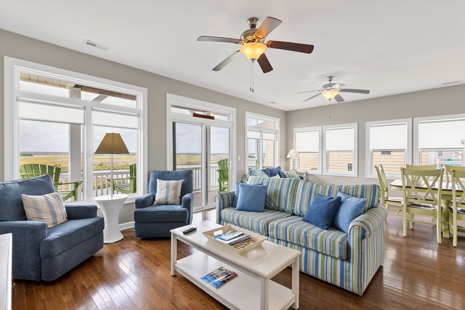 The open living area with a Smart TV and covered porch access