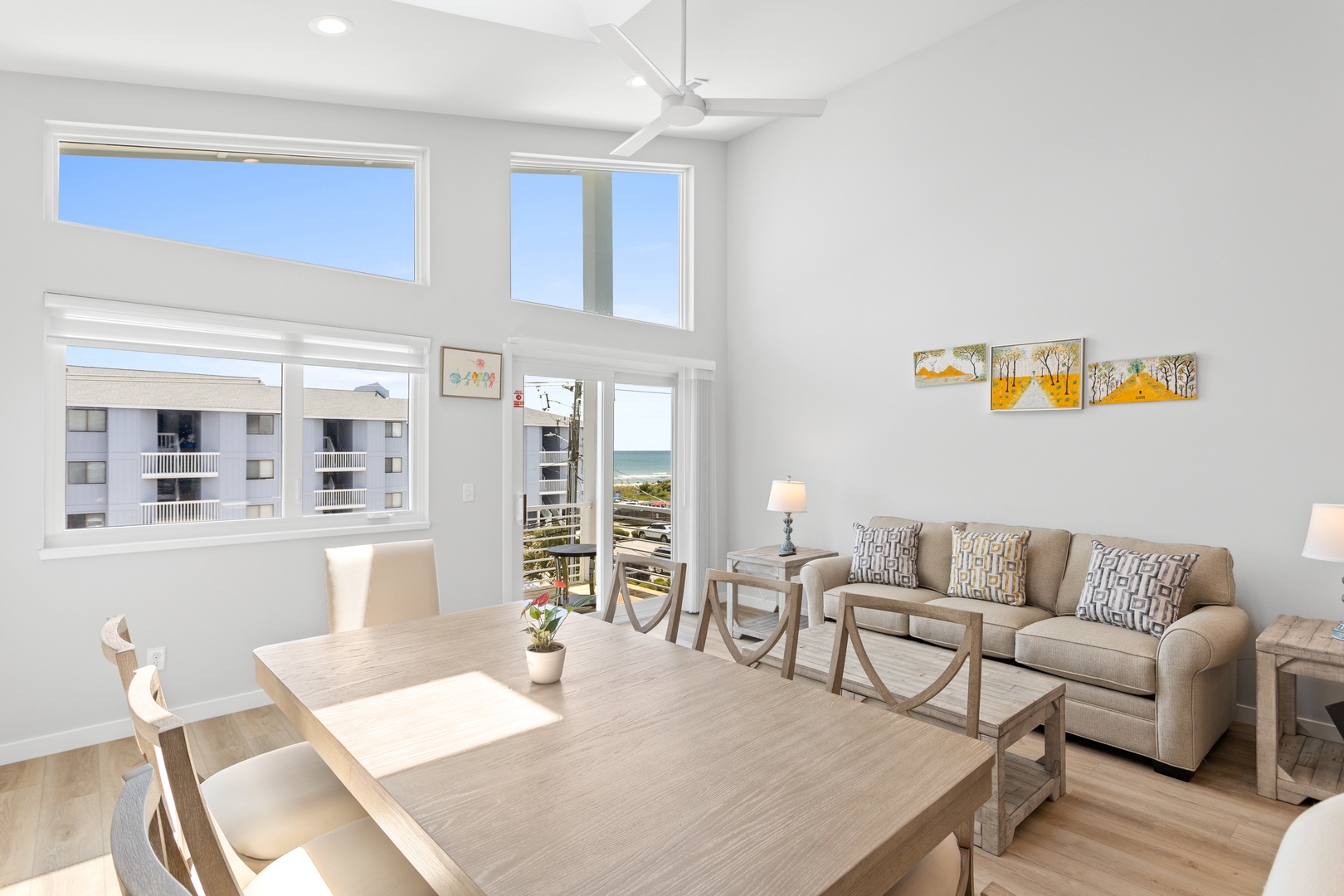 The open living and dining area with seating for 8