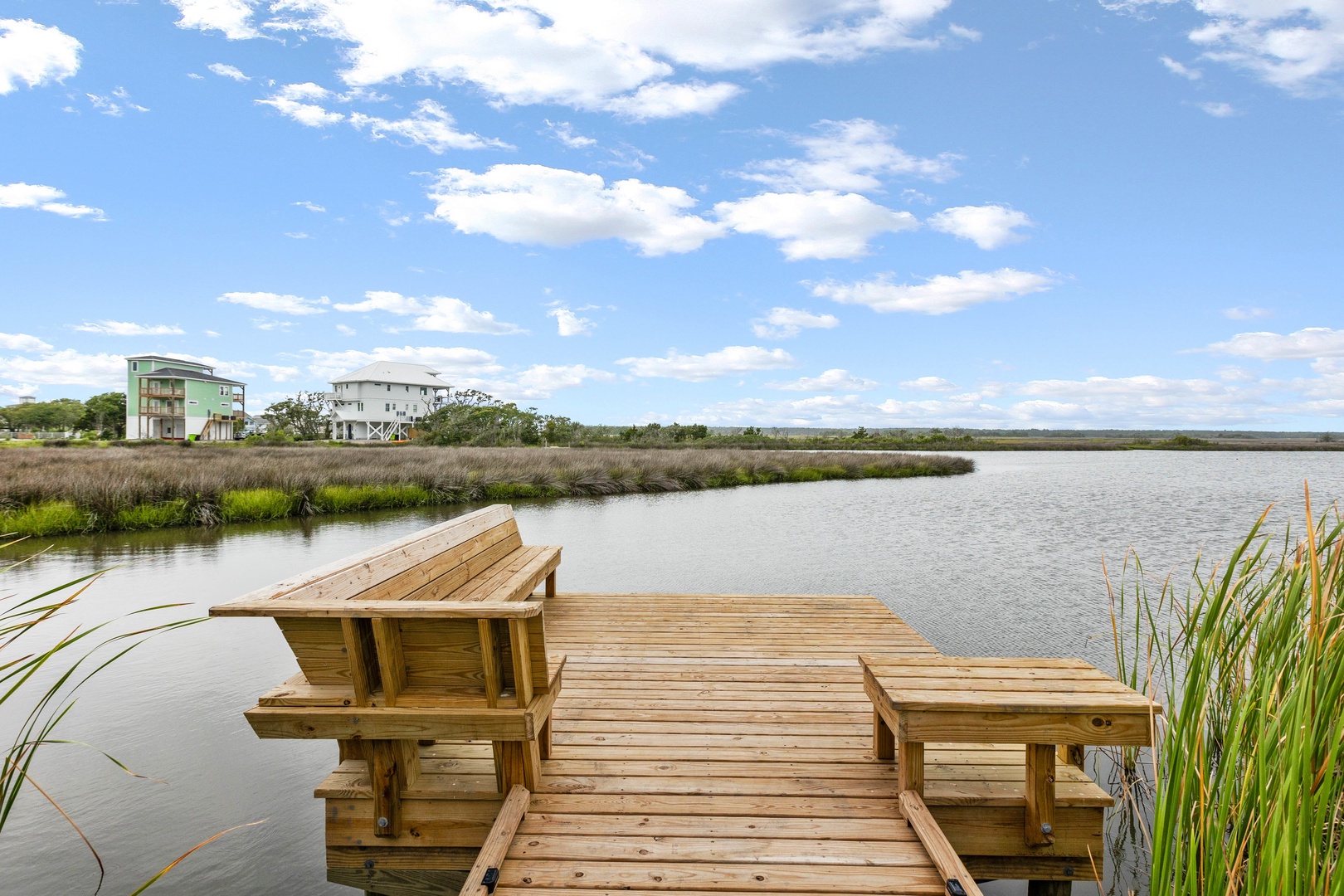 The dock behind the property with extra seating