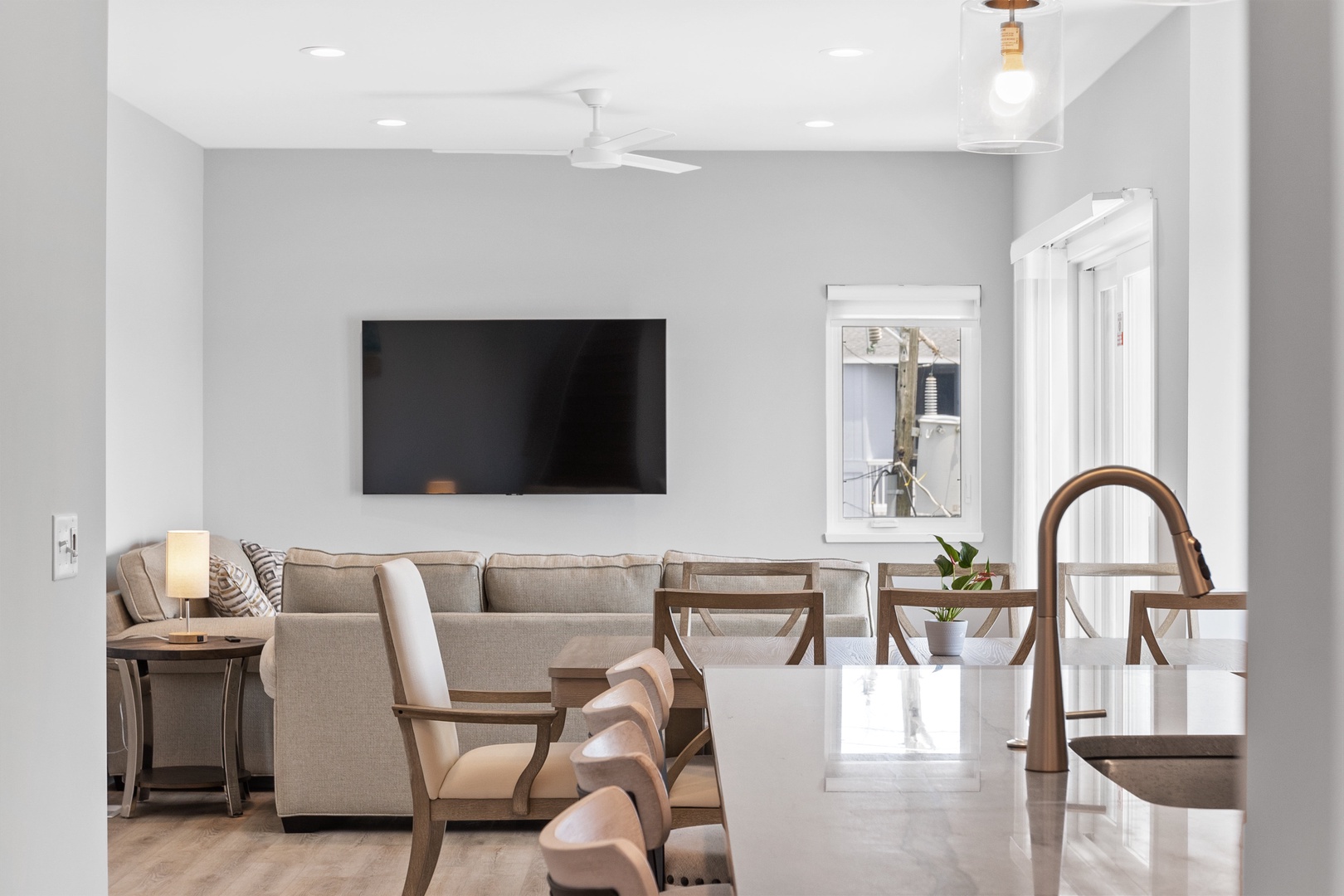 The open kitchen, living, and dining areas