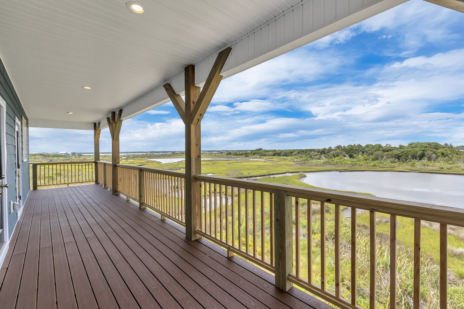 The covered deck with estuary views