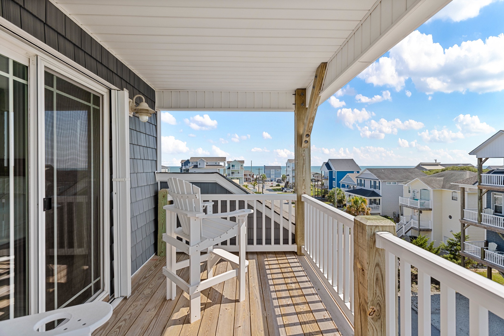 Top level balcony access just off of the primary bedroom