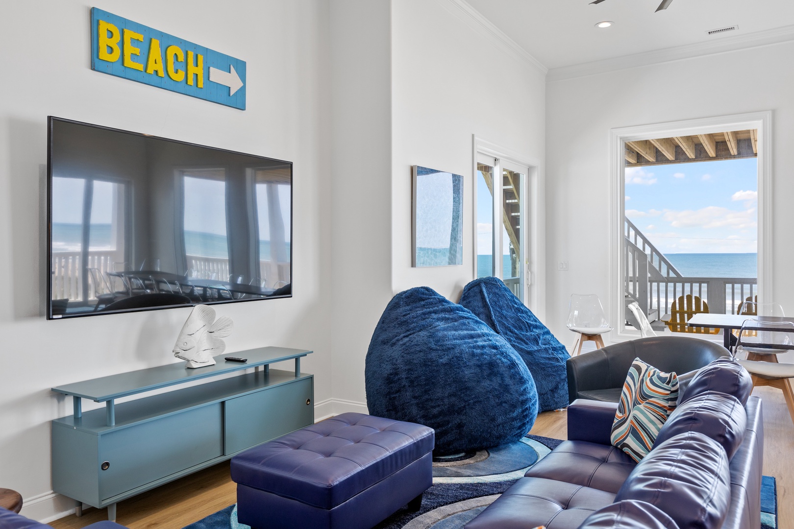 The living area with ample seating and a Smart TV