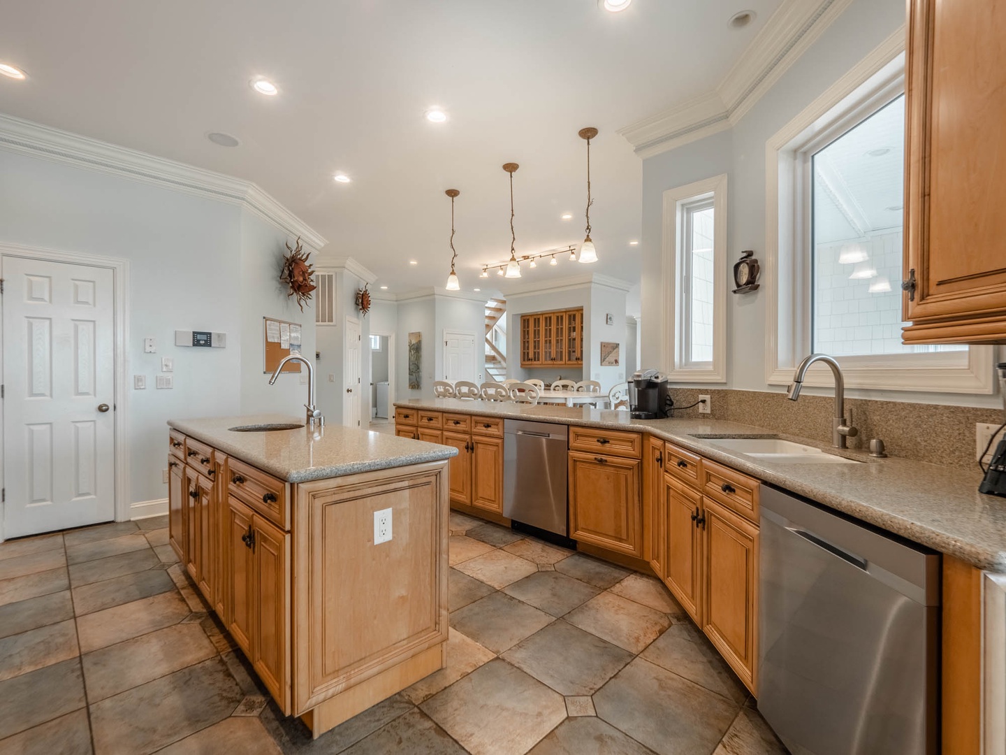 The spacious kitchen with countertop seating for 6