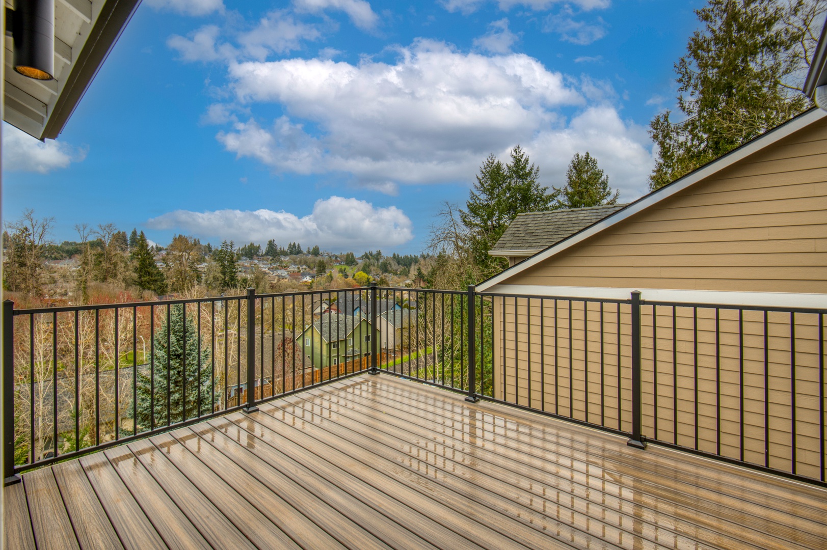 Step onto your private 2nd story deck and breathe in the fresh air while gazing at peaceful neighborhood views and lush greenery.