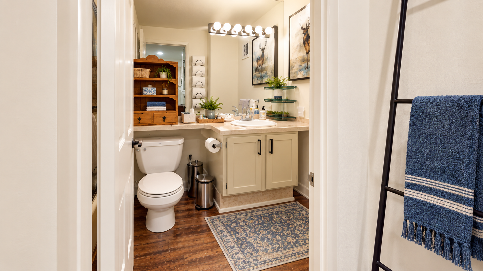Freshen up in your tastefully decorated bathroom, where warm wood tones and thoughtful touches create a welcoming retreat after a day exploring the area.