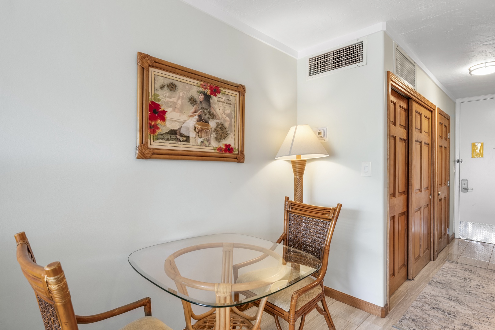 Step inside to find a cozy dining nook with tropical-inspired décor, perfect for enjoying your morning coffee or planning the day's adventures together.