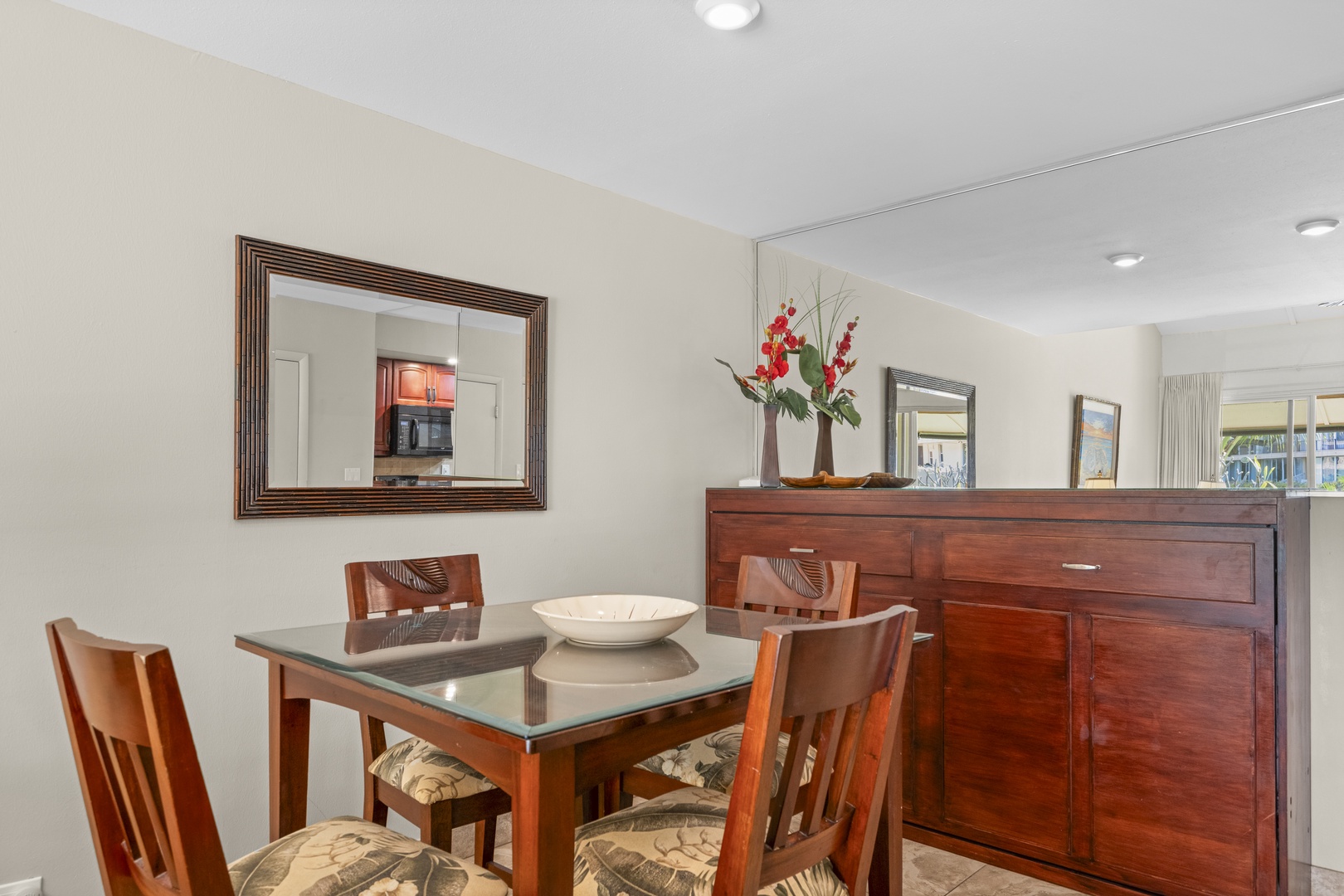 Gather around this glass-top dining table for meals and memories, with tasteful décor and an open flow connecting you to the rest of your home.