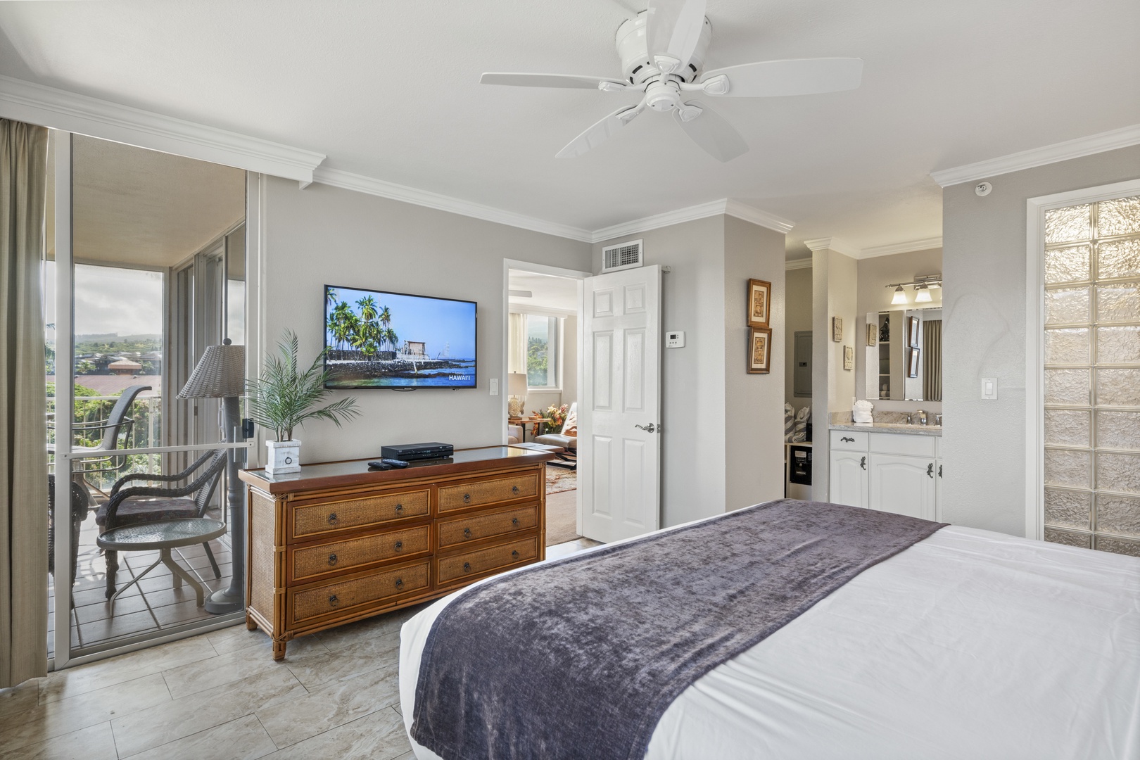 Your elegant bedroom opens to a private balcony where you can sip morning coffee or unwind after a day of exploring. Gentle breezes and peaceful moments await.