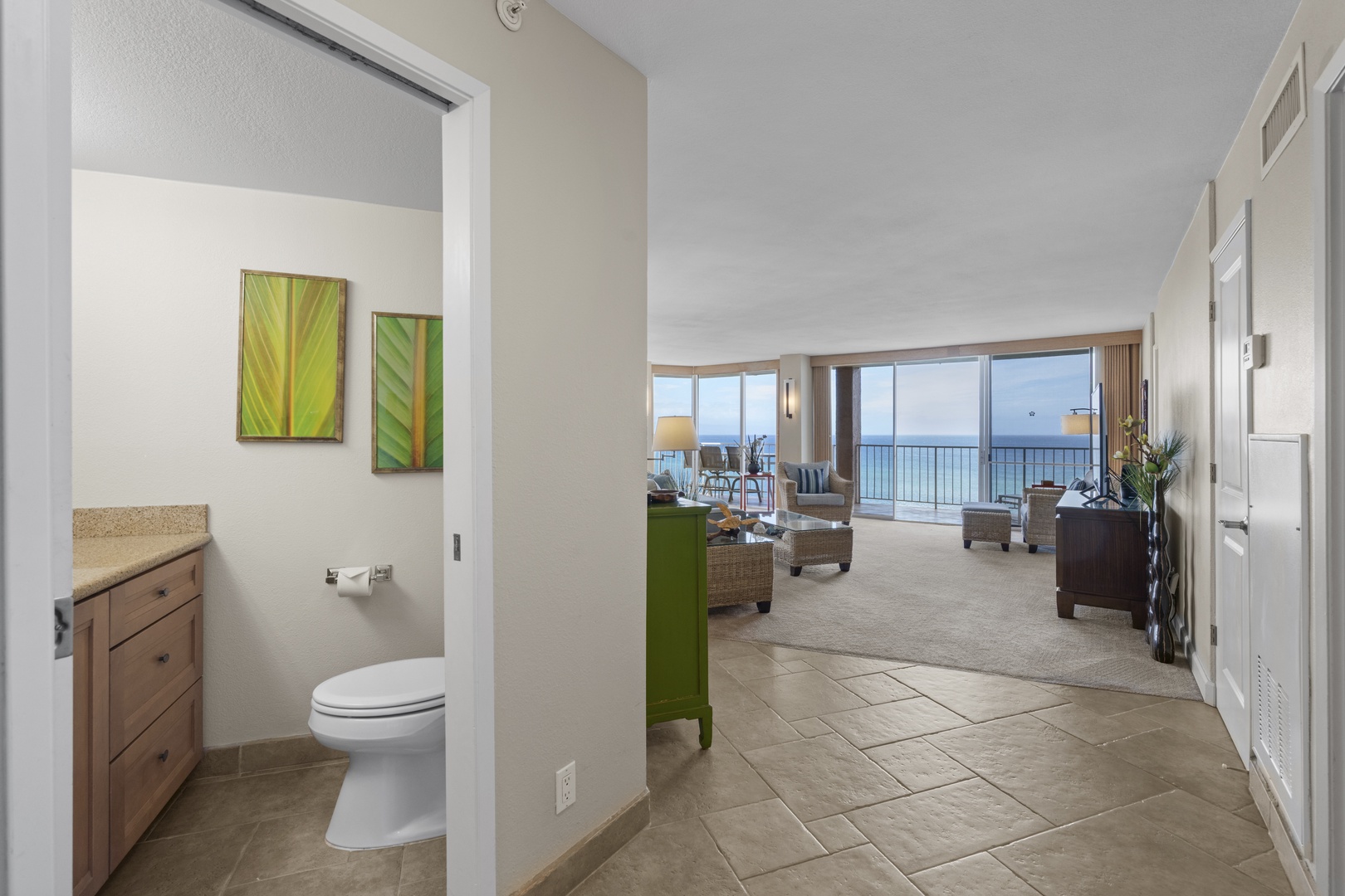 Your spacious oceanfront suite opens to breathtaking sea views and elegant living spaces with modern amenities throughout.