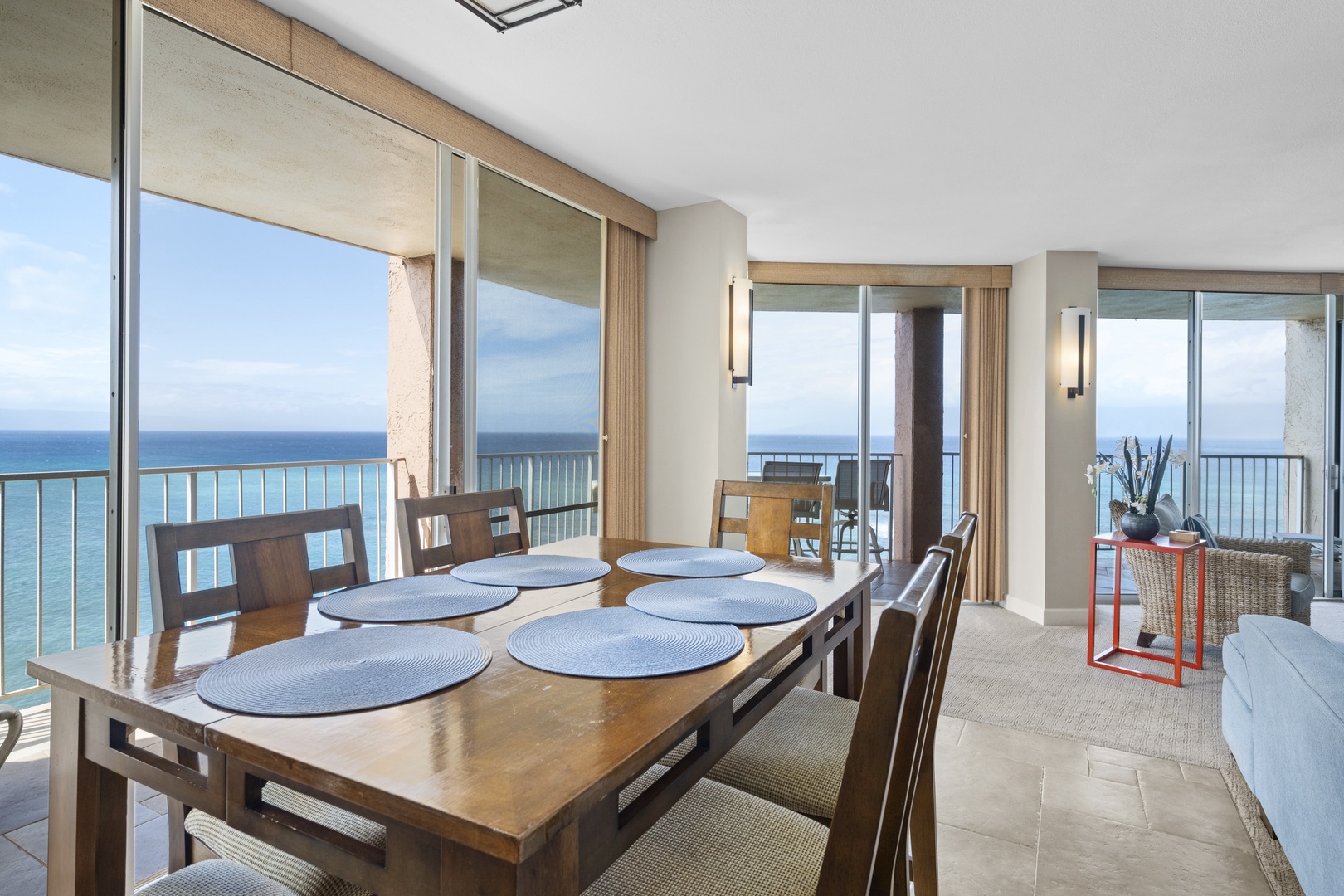 Gather around your oceanfront dining table where every meal comes with breathtaking sea views through floor-to-ceiling windows.