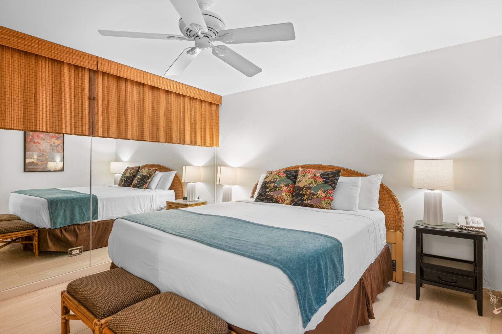 Step into your serene bedroom retreat with comfortable beds, tropical accents, and soothing light that invites restful nights and peaceful mornings.