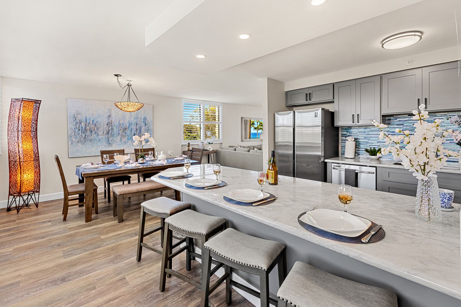 Your spacious kitchen flows seamlessly into the dining area, perfect for preparing meals and gathering with loved ones over intimate dinners.