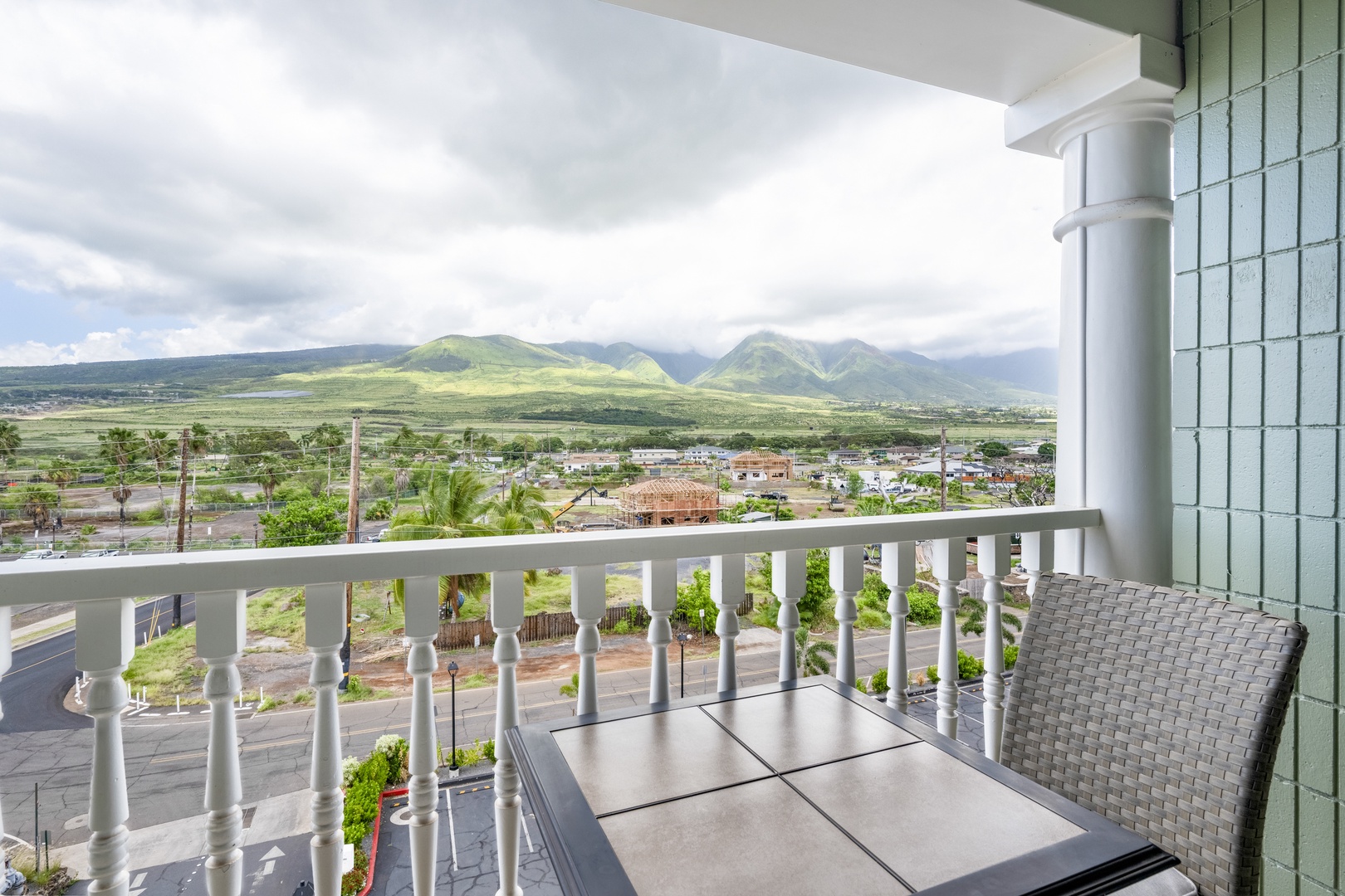 Perched on this private balcony, you'll enjoy sweeping mountain vistas with lush green peaks stretching beyond, creating a stunning tropical escape that feels miles from the everyday.