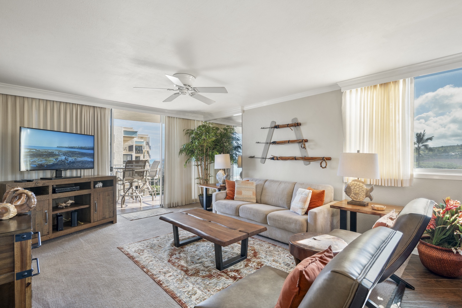 Settle into your airy living space with coastal touches and comfortable seating, opening directly to your private balcony overlooking the ocean.