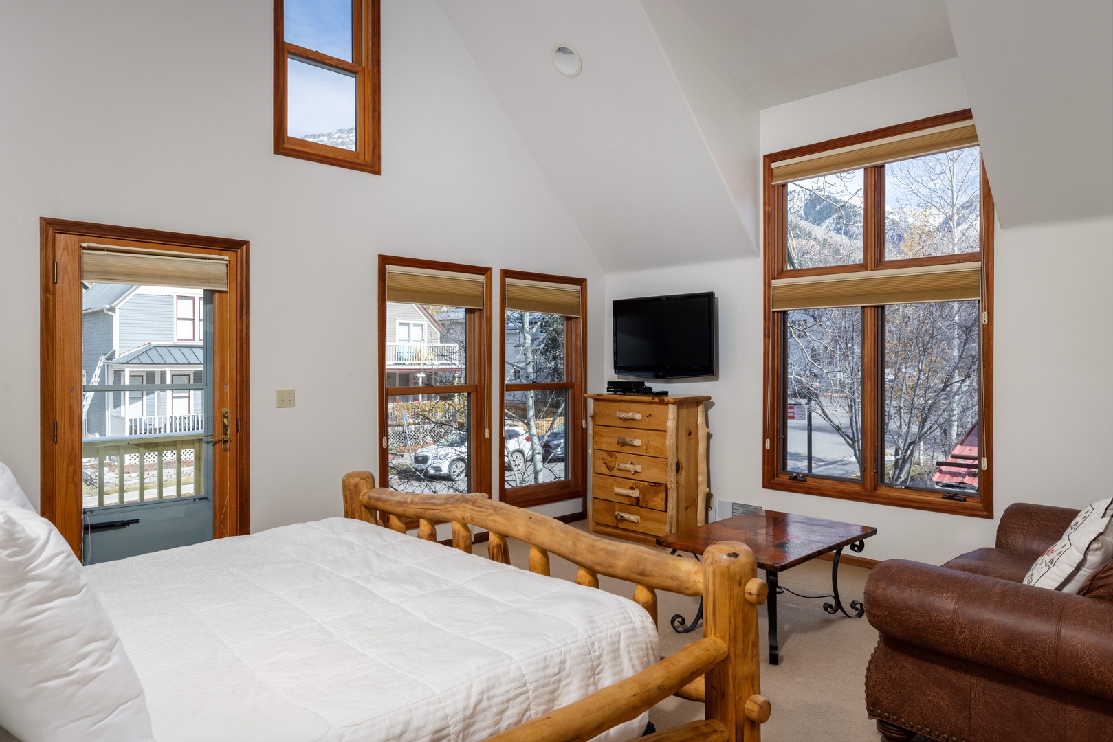 Primary Bedroom - King bed, en suite bath and vaulted ceilings